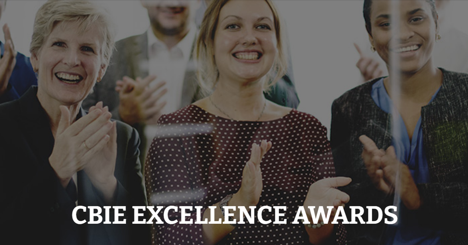 a small group of people celebrating an accomplishment